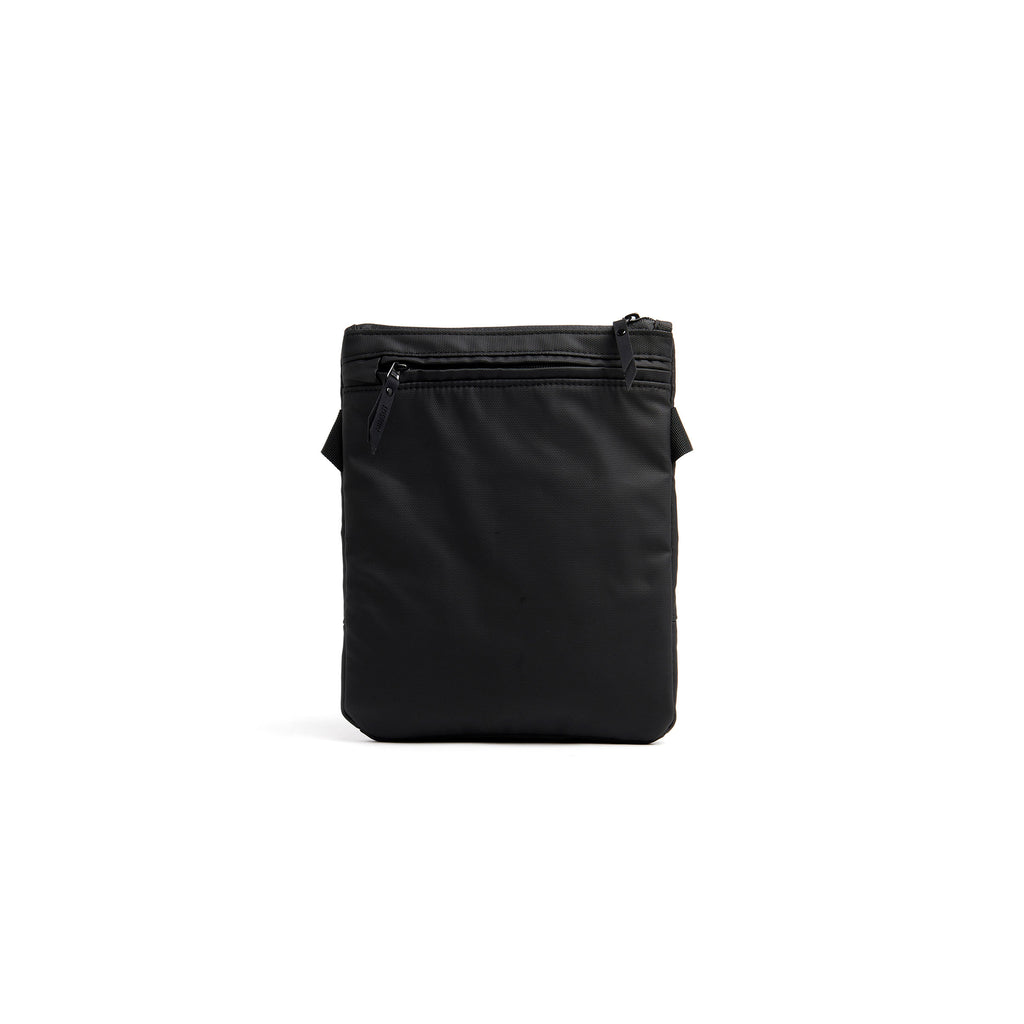 Mueslii crossbody, made of PU coated waterproof nylon, color black, back view.