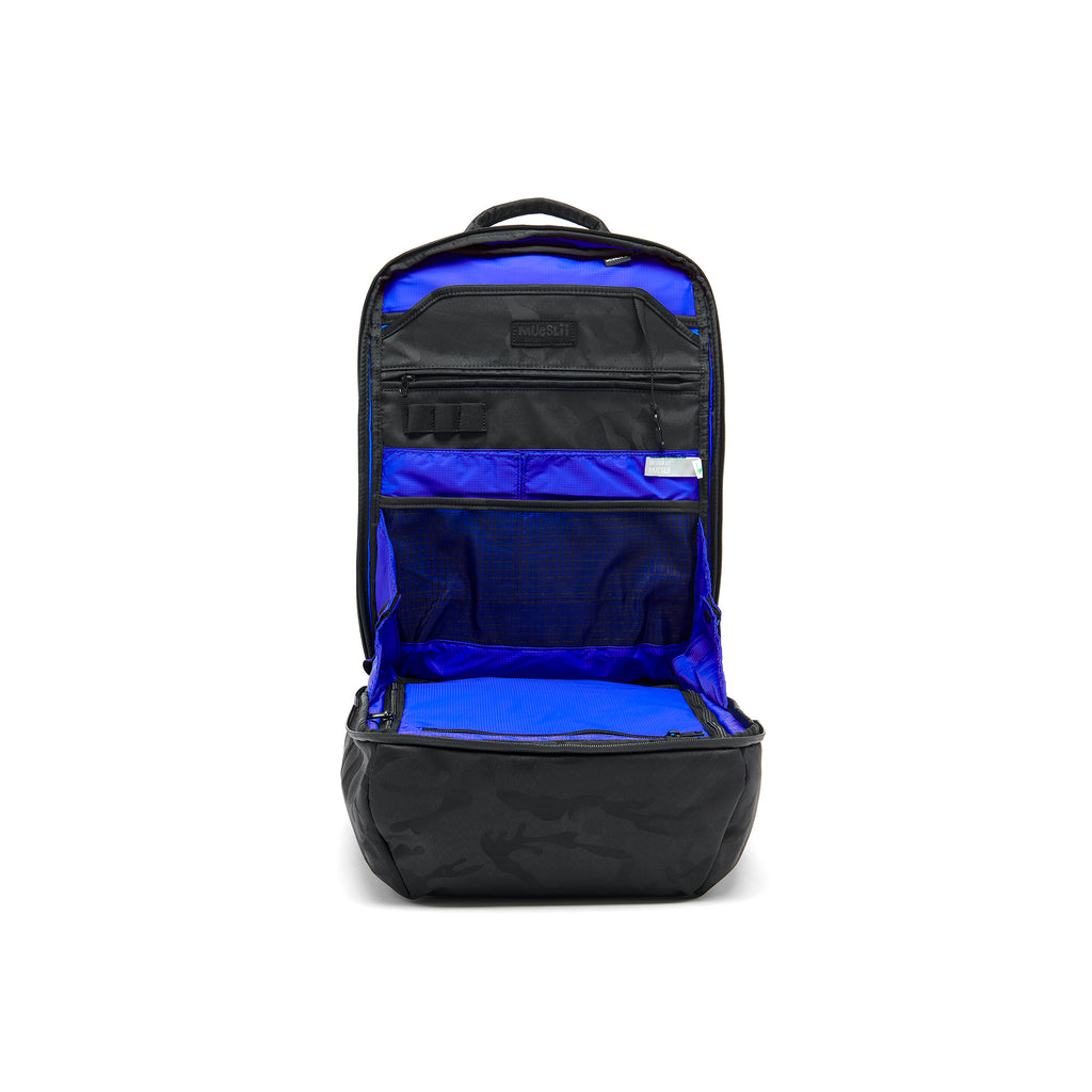 Mueslii travel backpack, made of waterproof jacquard nylon, camouflage pattern, with a laptop compartment, color black, inside view.