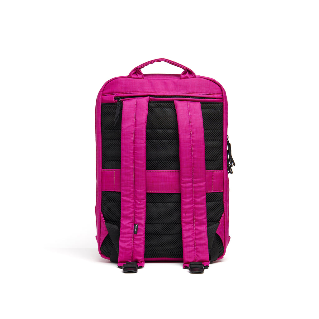 Mueslii daily backpack, made of  water resistant canvas nylon, with a laptop compartment, color fuchsia, back view.