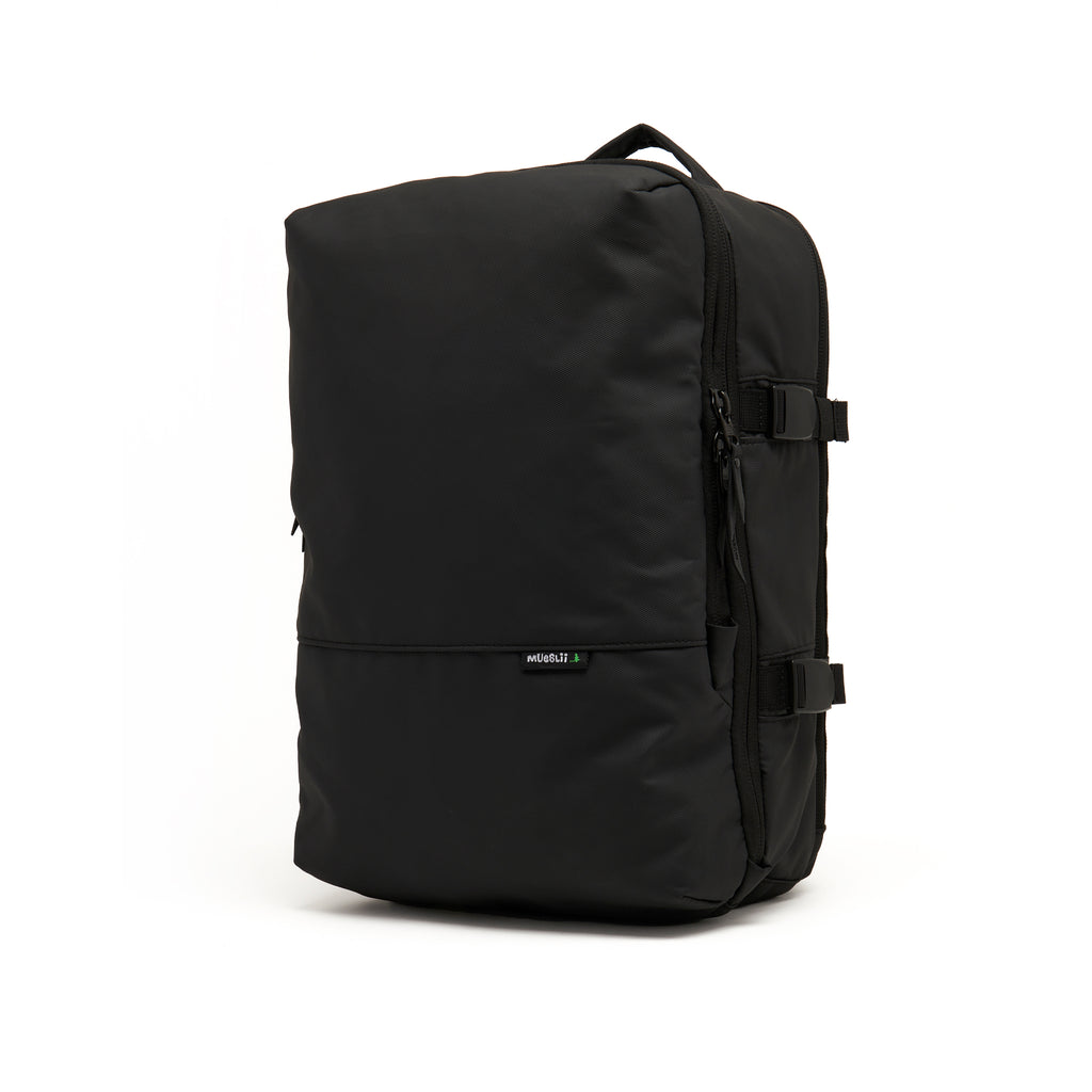 Mueslii travel backpack, made of PU coated waterproof nylon, color black, side view.