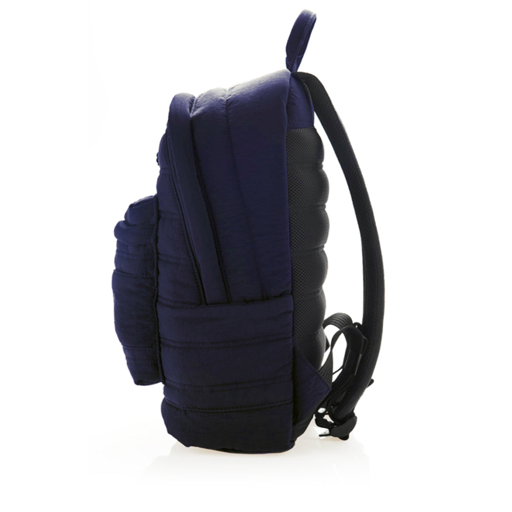 Mueslii original puffer laptop backpack made of high density nylon and Ykk zips, color matte blue, side view.