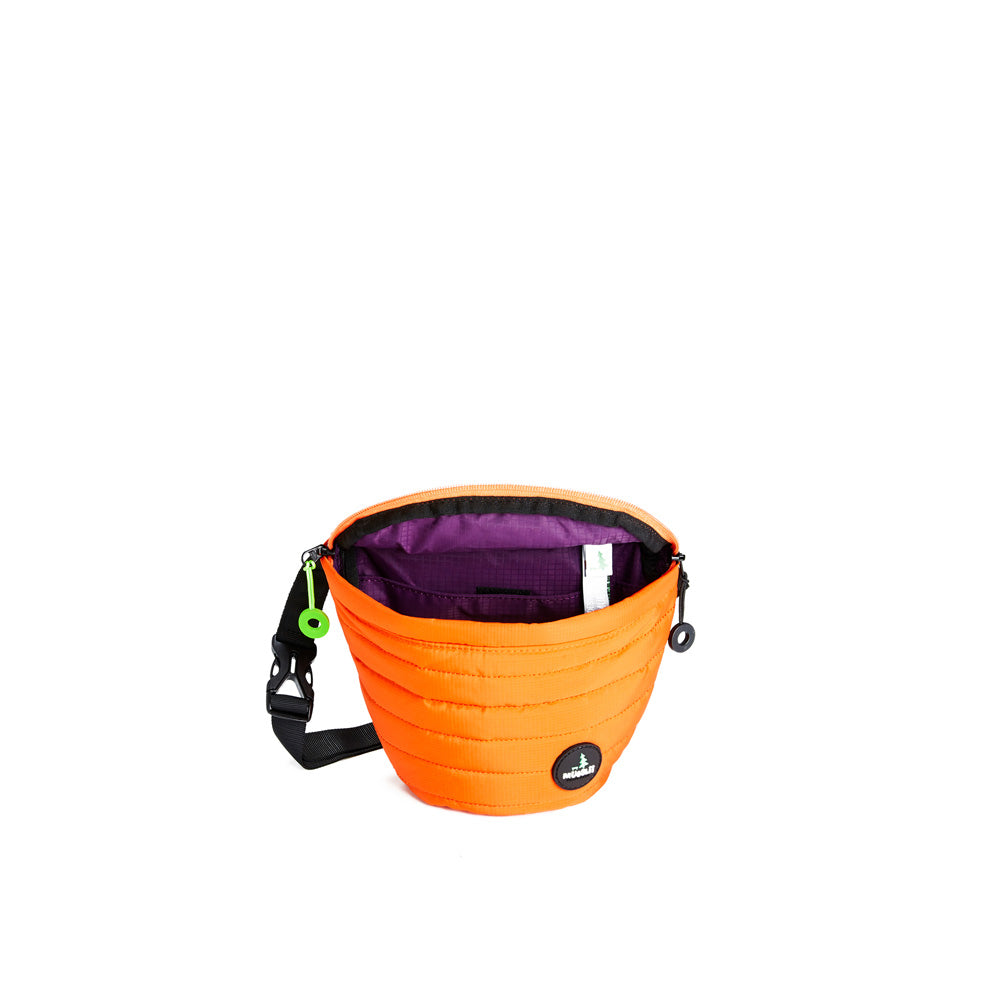 Mueslii puffer waist bag, made of high density nylon and Ykk zips, color high tech orange, medium size.