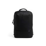 Mueslii daily backpack, made of PU coated waterproof nylon, with a laptop compartment, color coal black, front view.