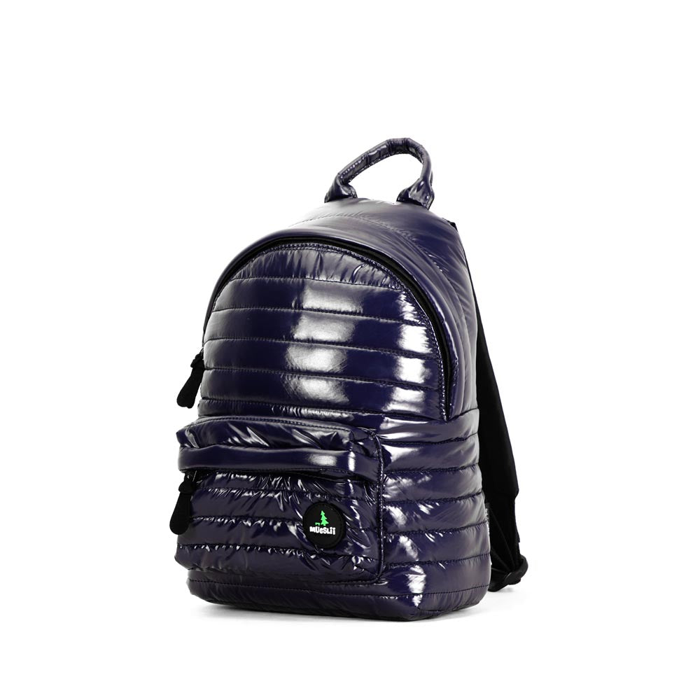 Mueslii original puffer medium and small backpack made of high density nylon and Ykk zips, color blue. Capacity: 9 liters.