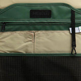 Mueslii daily backpack, made of PU coated waterproof nylon, with a laptop compartment, color green, inside view.