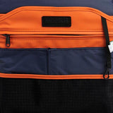 Mueslii daily backpack, made of PU coated waterproof nylon, with a laptop compartment, color orange, inside view.