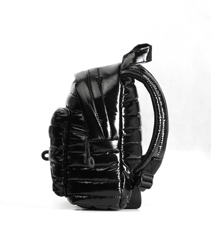 Mueslii original puffer extra small pack made of high density nylon and Ykk zips, color black, side view.