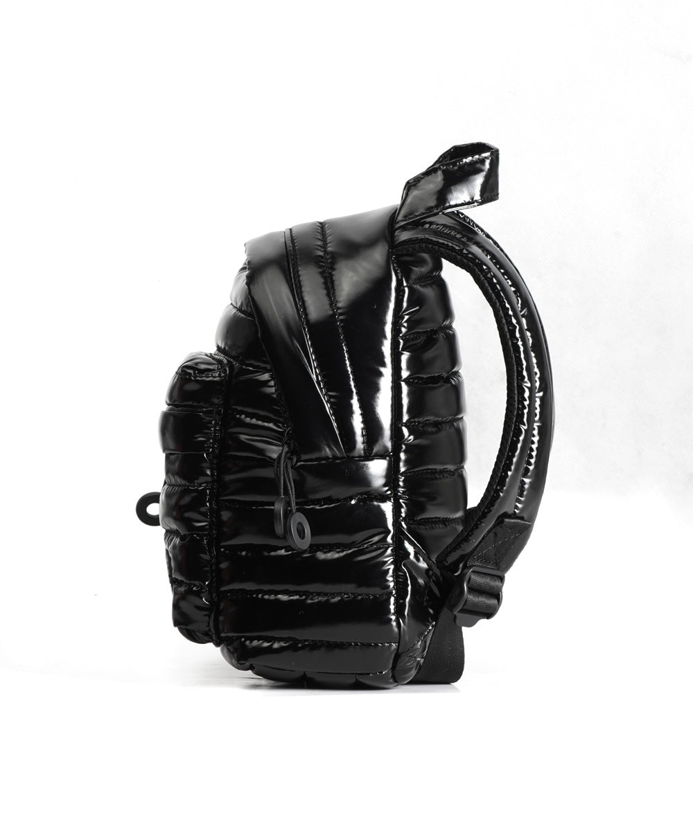 Mueslii original puffer extra small pack made of high density nylon and Ykk zips, color black, side view.