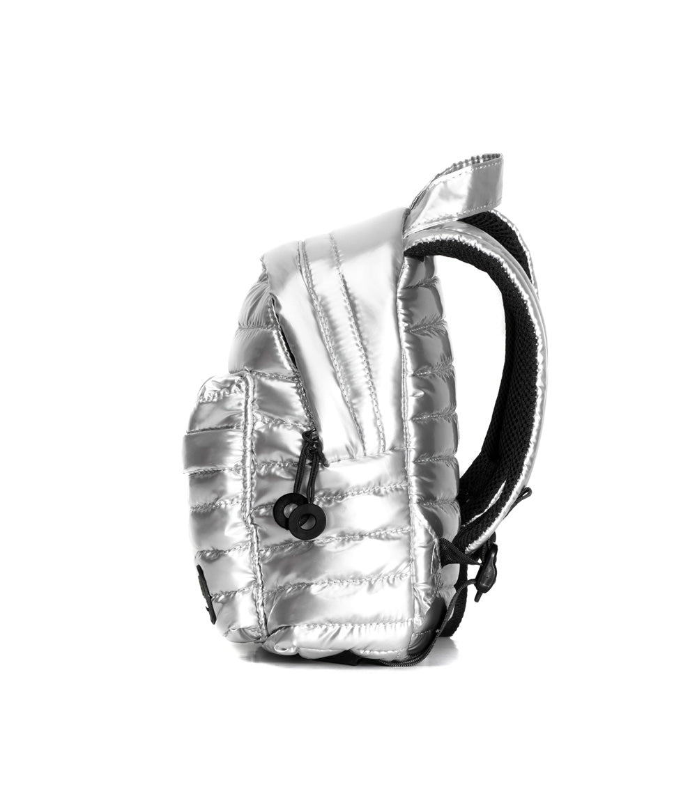 Mueslii original puffer extra small pack made of high density nylon and Ykk zips, color silver, side view.